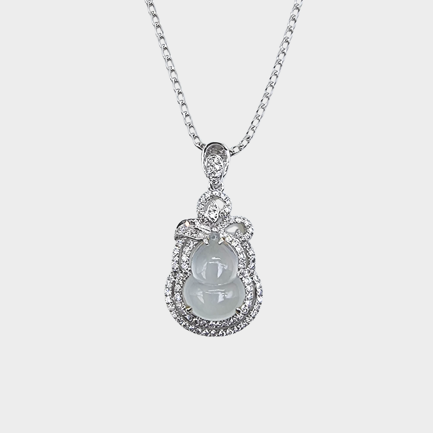 Icy Jadeite Jade "Hulu" Pendant in White Gold with Diamonds