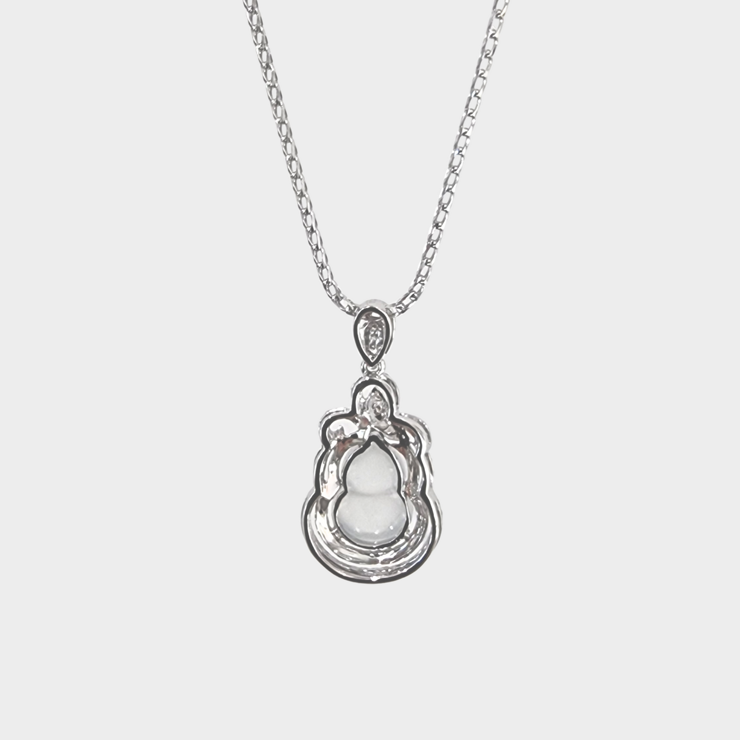 Icy Jadeite Jade "Hulu" Pendant in White Gold with Diamonds